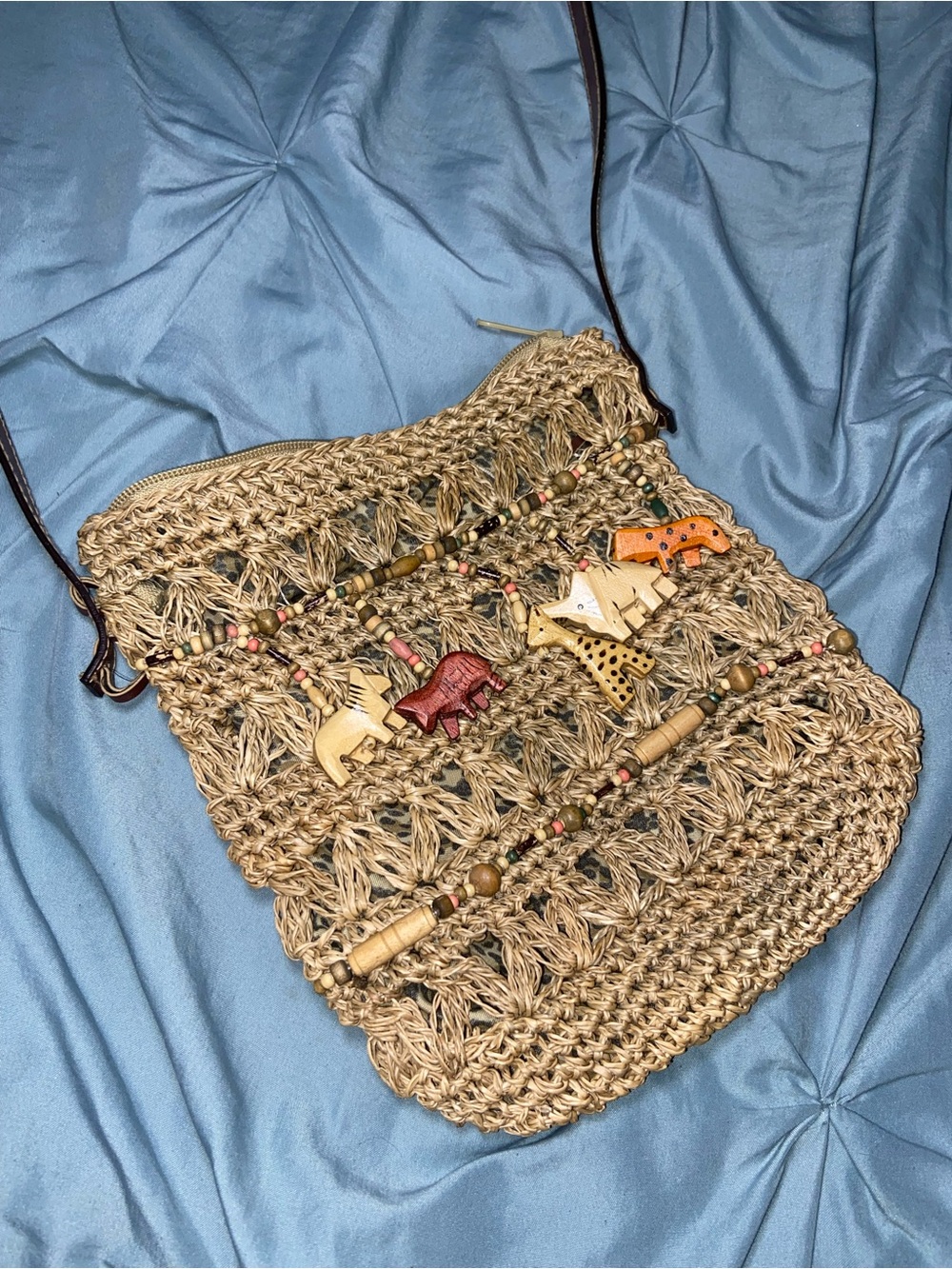 Handwoven Beige Raffia Crossbody Bag with Animal Bead Accents